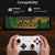 Gaming controller being used with a screen displaying a game, with compatibility text above.