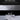 Thumbnail for Close-up of gaming controller buttons with text about features.