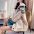 Fluffy Collar Christmas Women's Cardigan: Bold Xmas print for those colder months from NSE Imports #23.