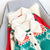 Fluffy Collar Christmas Women's Cardigan: Bold Xmas print for those colder months from NSE Imports #25.