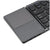Compact keyboard with trackpad on a white background