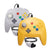 Two classic-style wired game controllers for the Nintendo 64/N64 on a white background: one in light gray and one in bright yellow, both with black cables and standard button layouts.