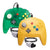 Two retro-style wired game controllers for the Nintendo 64/N64 on a white background: one translucent green controller in the back and one solid yellow controller in the front, both with gray joysticks and colored action buttons.