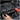 Thumbnail for A person using a red cordless torque wrench to tighten a lug nut on a car engine, shown in a real-world garage or workshop environment.