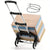 A silver and black folding hand truck with a black handle and a black strap accessory, shown pushing two stacked cardboard boxes on a white background.