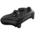 Black gaming controller on a white background