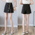 Asymmetrical A-Line Skorts with Button Detailing: A Stylish and Versatile Option for Any Occasion from NSE Imports #5.