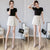 Asymmetrical A-Line Skorts with Button Detailing: A Stylish and Versatile Option for Any Occasion from NSE Imports #7.