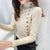 Asymmetric Ribbed Turtleneck Women's Sweater: Slim Look with Large Faux Buttons from NSE Imports #15.