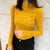 Asymmetric Ribbed Turtleneck Women's Sweater: Slim Look with Large Faux Buttons from NSE Imports #18.