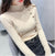 Asymmetric Ribbed Turtleneck Women's Sweater: Slim Look with Large Faux Buttons from NSE Imports #24.