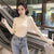 Asymmetric Ribbed Turtleneck Women's Sweater: Slim Look with Large Faux Buttons from NSE Imports #26.