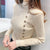 Asymmetric Ribbed Turtleneck Women's Sweater: Slim Look with Large Faux Buttons from NSE Imports #8.