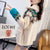 Fluffy Collar Christmas Women's Cardigan: Bold Xmas print for those colder months from NSE Imports #6.